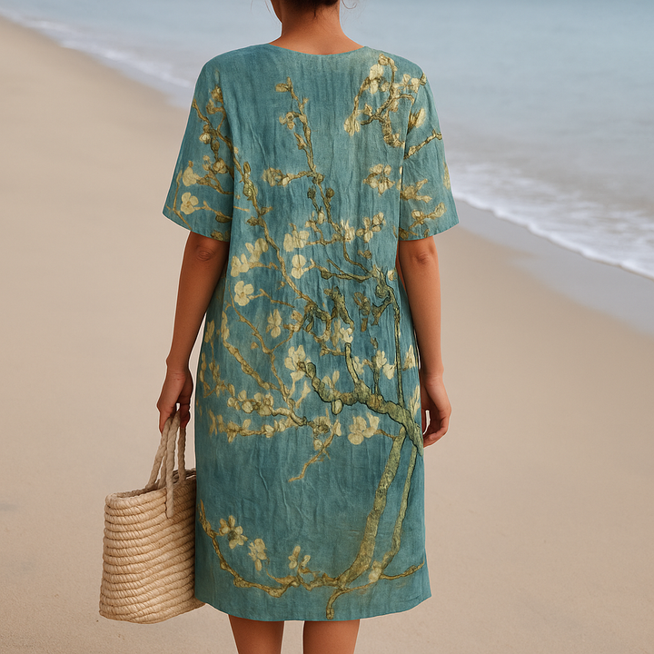 Gloria - Blue-green dress with floral print